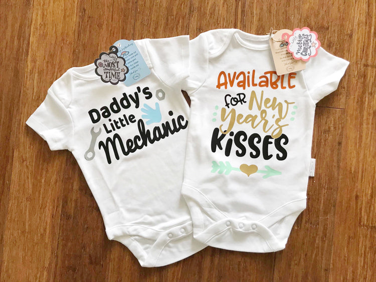 Available for New Year Kisses Baby Bodysuit